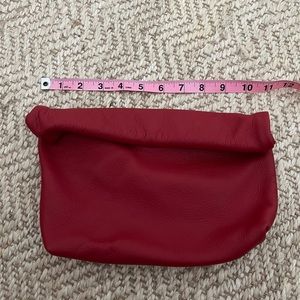 Lili T red leather clutch